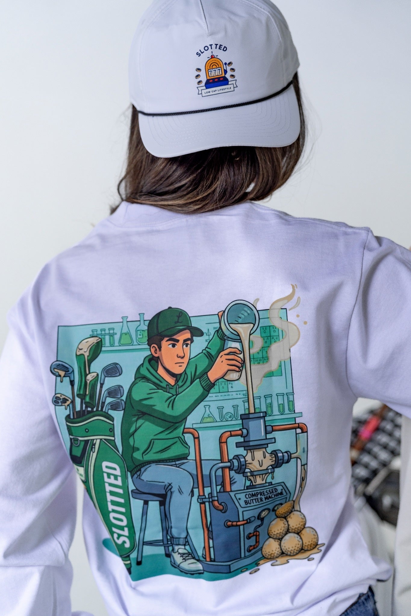 Person wearing a white Compressed Butter Technician Long sleeve 